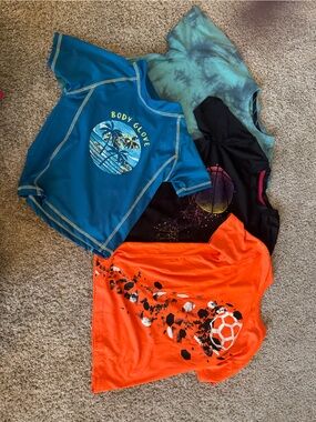 Multiple brand Boys' Short Sleeve Tee shirts - orange, grey and teal.